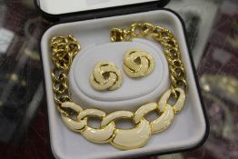 A necklace and earring set.