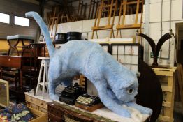 A giant fluffy blue cat.