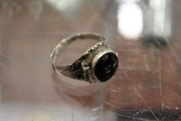 A small silver ring.