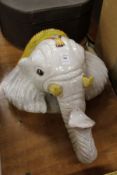 A large elephant head pottery wall bracket.