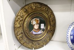 Continental porcelain and embossed circular portrait plaque.