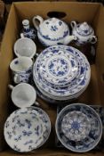 A quantity of blue and white china.
