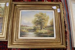 Rural River Landscape with Figure on a Path oil on board, in a decorative gilt frame.