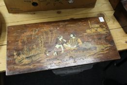 An inlaid pictorial wooden panel.