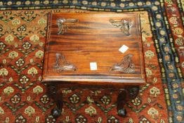 A small hardwood table.