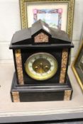 A Victorian slate mantle clock.