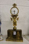 A good French ormolu mantle clock with figural support.