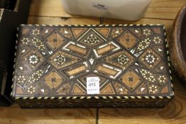 An eastern inlaid wooden box.