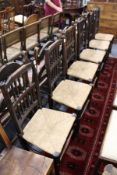 A set of six 19th century Lancashire spindle back and rush seated dining chairs.