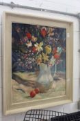 A still life of flowers in a jug oil on canvas, signed.