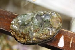 A Chinese carved pebble.