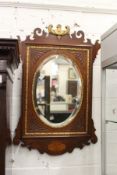 A George III design mahogany and inlaid fretwork wall mirror.