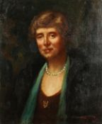 P. Tennyson, a bust length portrait of a lady, oil on canvas, signed and indistinctly dated, 24