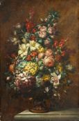 19th Century European School. A still life of mixed flowers in an urn, oil on oak panel, 17.25