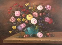 20th century continental school, A still life of mixed flowers in a blue vase, oil on card,