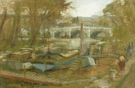 Dennis Gilbert (B.1922) British, a view of moored boats on a river with a bridge and buildings