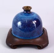 A GOOD CHINESE JUN WARE PORCELAIN WATER POT & HARDWOOD STAND, the pot with a drip glaze base, and