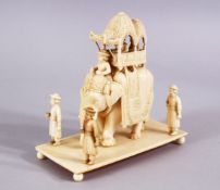 A FINELY 19TH CENTURY INDIAN CARVED IVORY ELEPHANT IN PROCESSION, 13cm high x 6.5cm.