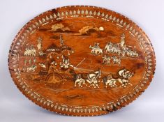 A 19TH CENTURY INDIAN INLAID TABLE TOP, inlaid with bone to depict native Indian scenes of figures