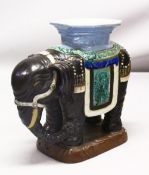 A GOOD 19TH / 20TH CENTURY CHINESE POTTERY ELEPHANT GARDEN SEAT OR STAND, with panels of dragons
