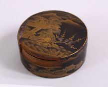 A JAPANESE TAISHO PERIOD DAMASCENE LACQUER BOX AND COVER, with views of landscapes and buildings,