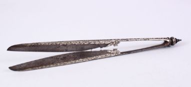 AN 18TH CENTURY THAI SILVER INLAID STEEL CEREMONIAL SCISSORS, with silver inlay floral decoration,