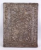 A LARGE 19TH CENTURY PERSIAN QAJAR REPOSÉ SILVER PANEL, with scenes of birds amongst formal floral