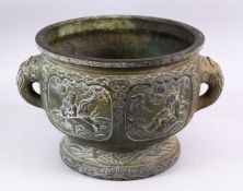A 19TH CENTURY CHINESE BRONZE IMMORTAL TWIN HANDLED CENSER, with carved panel decoration depicting