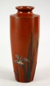 A JAPANESE MEIJI PERIOD BRONZE & MIXED METAL VASE, the red ground with a display of simple iris,