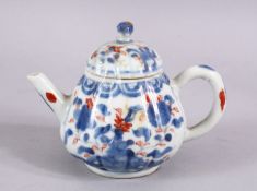 A 19TH CENTURY CHINESE IMARI PORCELAIN TEAPOT, the ribbed body decorated in typical imari palate,