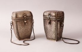 A GOOD PAIR OF JAPANESE MEIJI PERIOD SILVER WOVEN SILVER LIDDED BASKETS, both with chains, 10cm high