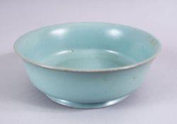 A CHINESE CELADON RU WARE POTTERY CALLIGRAPHIC BOWL, the base of the bowl with gilded incised