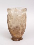 AN UNUSUAL CARVED ROCK CRYSTAL BEAKER, possibly early Persian, 11.5cm.