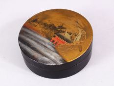 A 20TH CENTURY CHINESE LACQUER CIRCULAR BOX & COVER, decorated with native waterside views , 12cm
