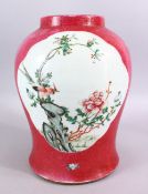 A 19TH / 20TH CENTURY CHINESE PINK GLAZE FAMILLE ROSE PORCELAIN JAR, with panel decoration depicting