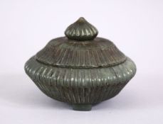 AN 18TH 19TH CENTURY MUGHAL INDIAN CARVED JADE LIDDED BOX , with a carved ribbed body, in three