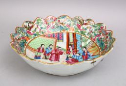 A 19TH CENTURY CHINESE CANTON FAMILLE ROSE PORCELAIN LOBED BOWL, the body of the bowl with panel