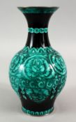 A JAPANESE MEIJI / TAISHO PERIOD SILVER MOUNTED CLOISONNE VASE, the black ground with turquoise /
