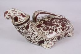 A CHINESE YUAN STYLE UNDERGLAZE RED PORCELAIN DRAGON LIDDED VESSEL, in the form of a mythical beast,