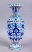 A 19TH CENTURY ISLAMIC BLUE , TURQUOISE AND WHITE POTTERY MULTAN VASE, decorated with blue formal