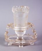 A CHINESE CARVED GLASS LIBATION CUP & STAND, the stand with an opening supported by chilong, the