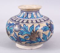 AN GOOD TURKISH POTTERY GLOBULAR VASE, decorated with formal floral decoration, 12cm high.