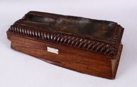 A GOOD EGYPTIAN CARVED HEAVY HARDWOOD WOODEN TOOL MOULD, with brick form carved sides, the top