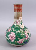 A 20TH CENTURY CHINESE FAMILLE ROSE PORCELAIN BOTTLE VASE, decorated with raised enamel decoration