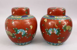 A PAIR OF 19TH / 20TH CENTURY CHINESE CLOISONNE GINGER JARS AND COVERS, decorated with a coral