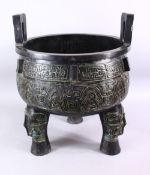 A LARGE AND HEAVY CHINESE WARRING STYLE STATES TRIPOD FORM TWIN HANDLE BRONZE CAST CENSOR, with