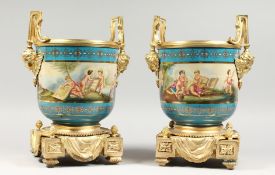 A PAIR OF IMPRESSIVE SEVRES STYLE PORCELAIN CACHE POTS with ormolu mounts and liners. 13ins high.