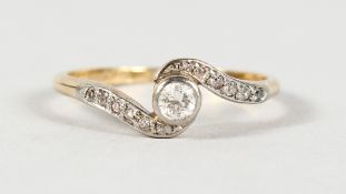 AN EDWARDIAN 18CT GOLD DIAMOND RING.