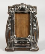 AN ART NOUVEAU SILVER PHOTOGRAPH FRAME, with BYRON'S MOTTO. 6ins high.