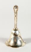 A SMALL SILVER TABLE BELL. 4ins high.